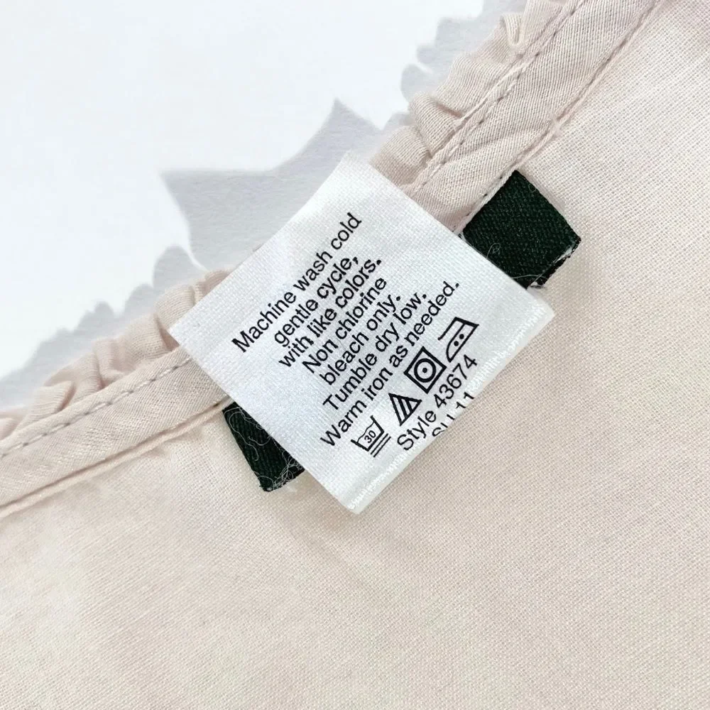 J. Crew blush ruffle tunic